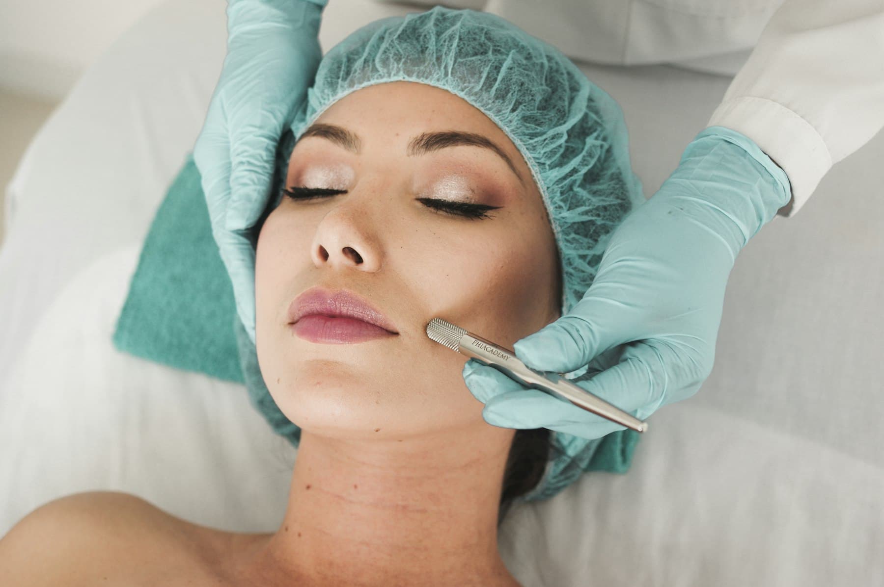 Client relaxing during a facial treatment